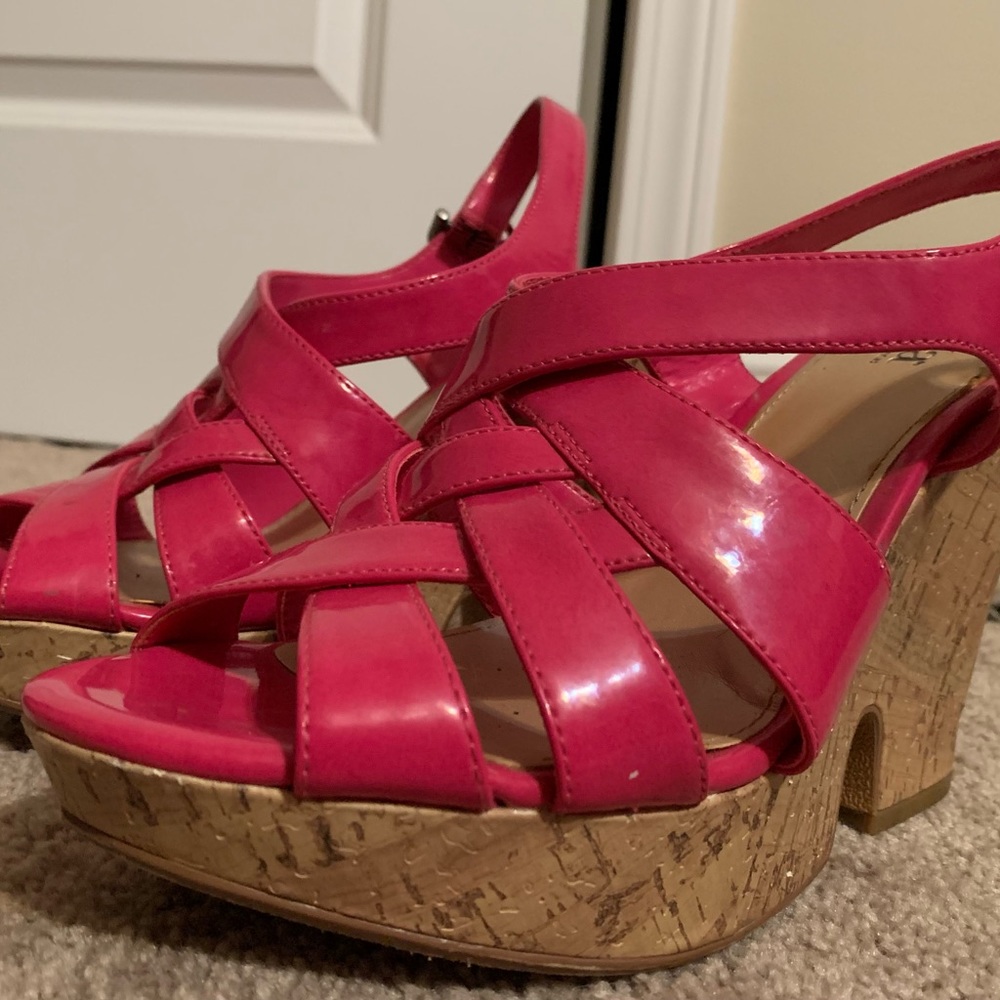 a.n.a. Fushia colored, patent leather 3 1/2” cork bottomed wedges. Size 10